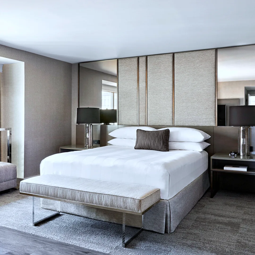 Hotel guestroom custom acoustic headboard and casegoods package